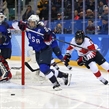 GANGNEUNG, SOUTH KOREA - FEBRUARY 22: USA's Kacey Bellamy #22 and Canada's Sarah Nurse #20 chase down a loose puck while Maddie Rooney #35 looks on during gold medal game action at the PyeongChang 2018 Olympic Winter Games. (Photo by Andre Ringuette/HHOF-IIHF Images)

